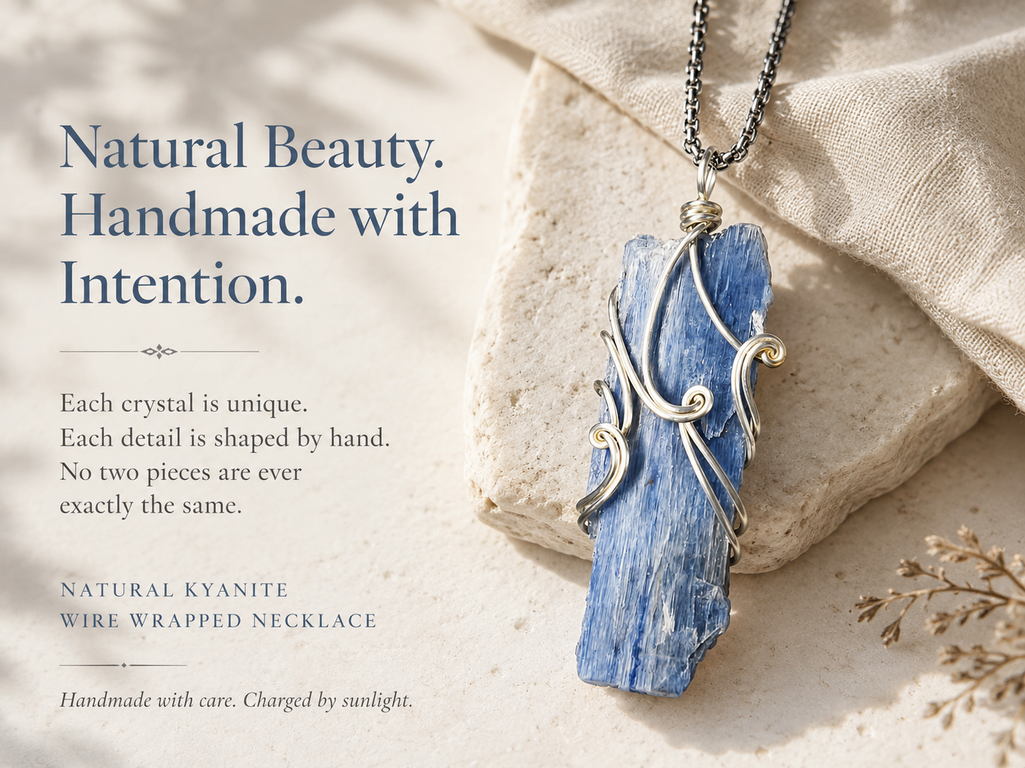 Natural kyanite wire wrapped necklace displayed in warm light to highlight organic crystal texture and handcrafted detail