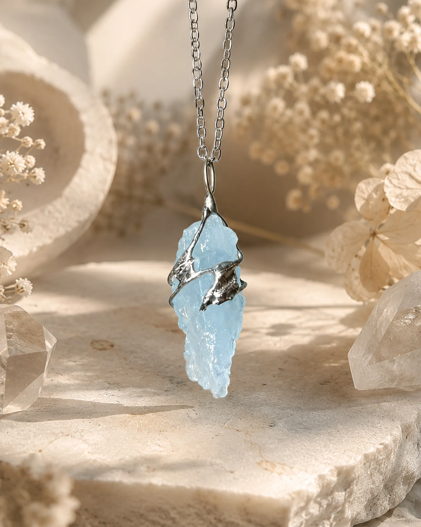 Handmade glacial blue crystal necklace with natural blue crystal pendant, symbolizing calm, clarity, and gentle emotional balance.