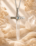 Handmade Lemurian quartz sword pendant necklace with silver-toned details, symbolizing clarity, inner strength, and focused intention.