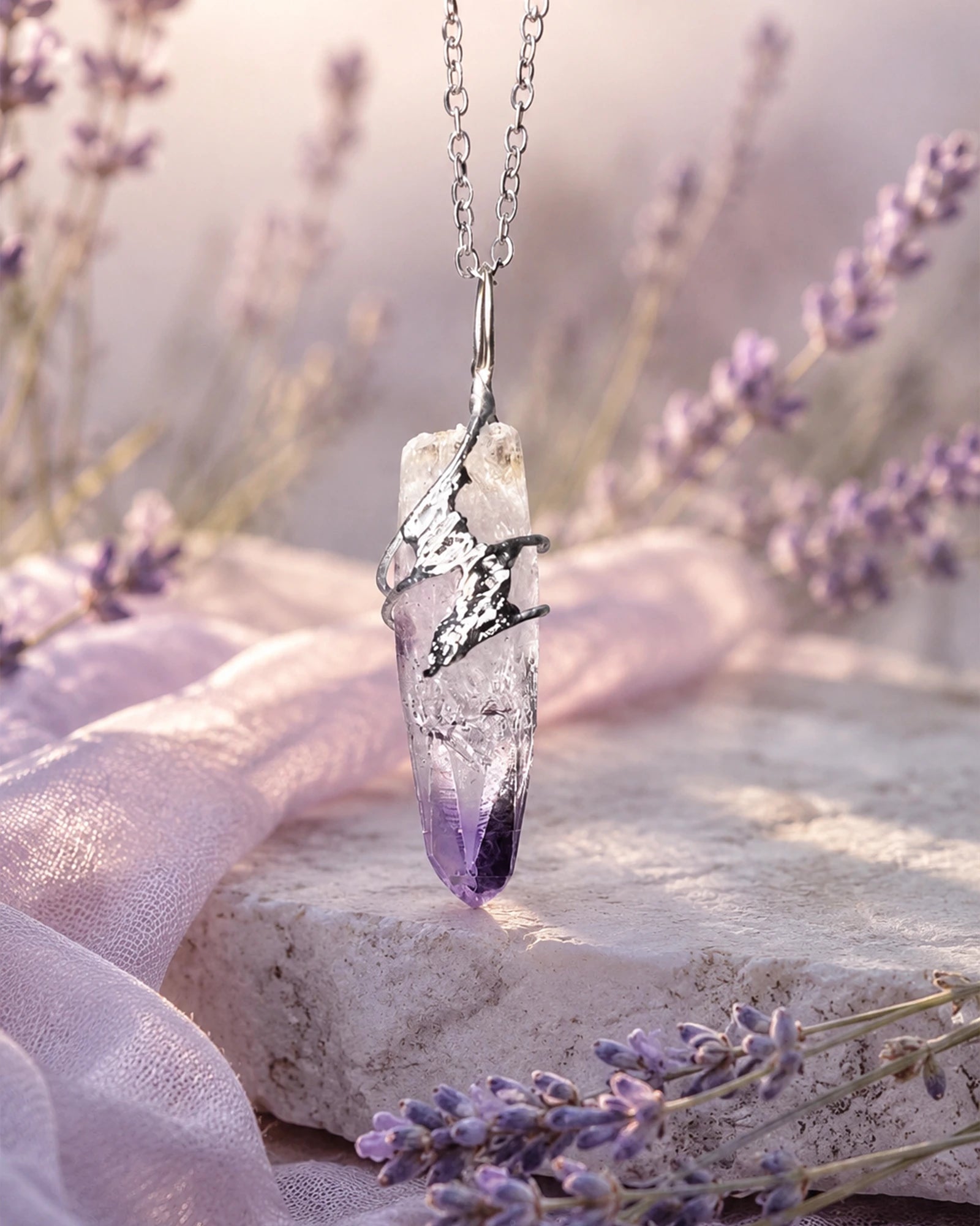 Cruz amethyst soldered pendant necklace styled in a calm natural setting with soft light, botanical details, and a peaceful handmade crystal jewelry aesthetic.