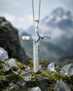 Lemurian quartz sword pendant necklace styled in a calm natural setting with soft light, botanical details, and a meaningful handmade crystal jewelry aesthetic.